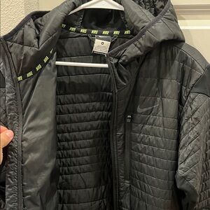 Exclusive Nike Men’s size medium down jacket with hood